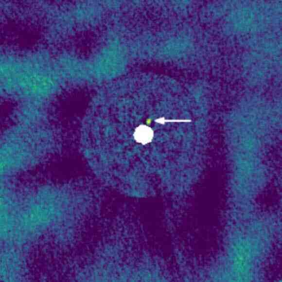 天文学家直接观测到邻近红矮星周围的褐矮星的配图