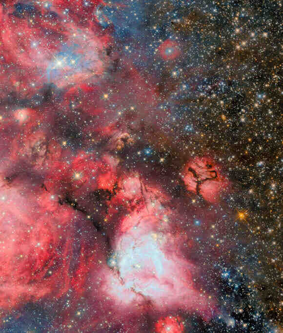 哈勃新图像聚焦巨大恒星形成云团 | 奇点天文的配图